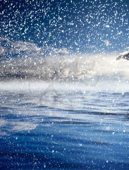 snowing at sea with a beautiful sky. beautiful background