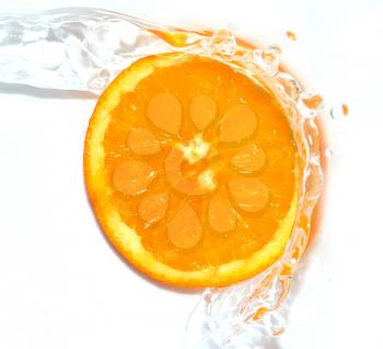 orange in water on white background