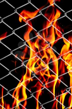 fire in a metal grid