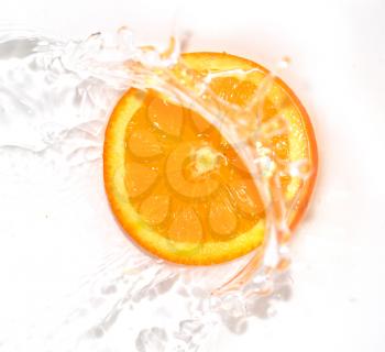 orange in water on white background