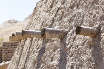 logs in the wall of the ancient city Sauran, Kazakhstan.