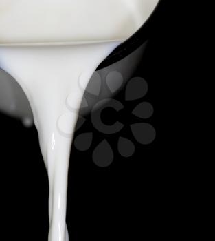milk on a black background