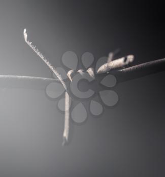 barbed wire on black background