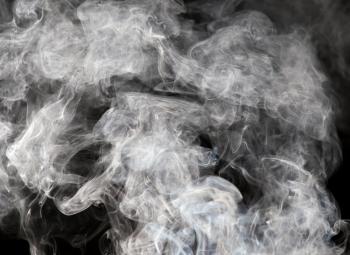 The abstract figure of the smoke on a black background