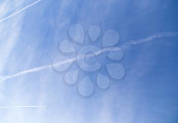 trace of an airplane against blue sky