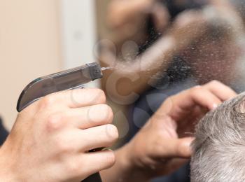 moisturizing hair in a beauty salon