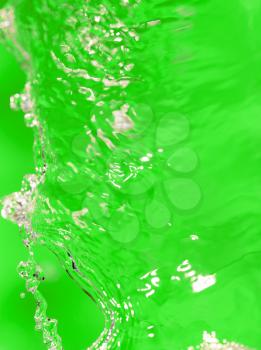 splashes of water on a green background