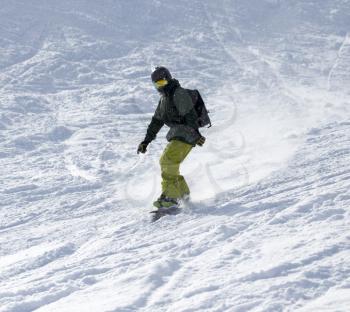 man snowboarding in the snow