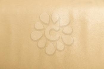 Closeup on cracked leather texture background.
