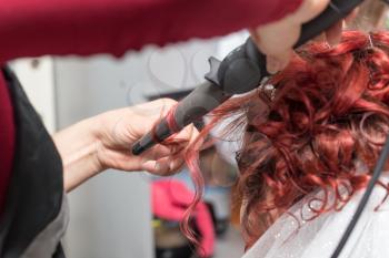 Wedding hairstyles with veil in the beauty salon