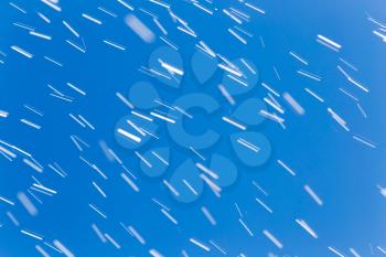 rain drops on a background of blue sky