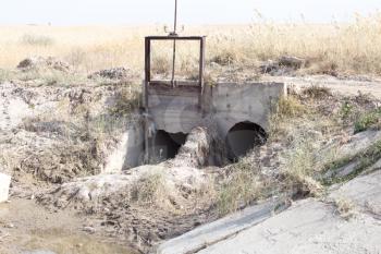 a concrete ditch on the nature