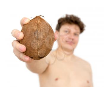 Coconut in a man's hand on a white background