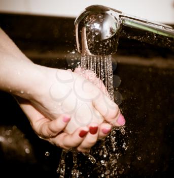 hand washing with tap water