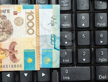 Kazakh tenge on the laptop keyboard