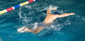 boy swimming in the pool