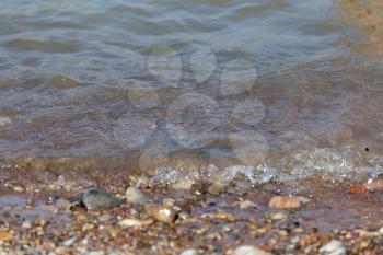 wave on the shore as the background