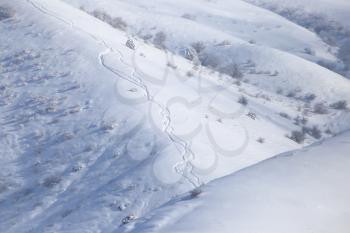 snowy mountainside outdoors in winter