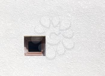 window on a white wall as a background