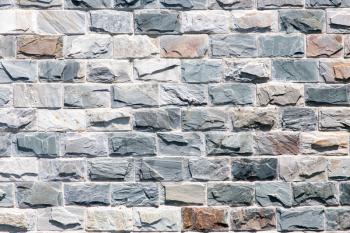wall of granite bricks as background