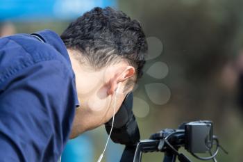 the operator removes the film on video