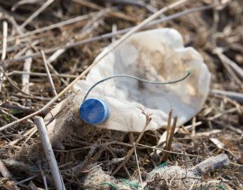 bottle in nature as garbage