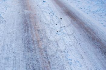 trace of wheel cars in the winter morning