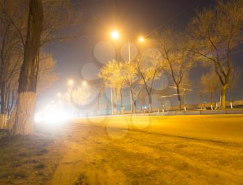 road at night with moving cars