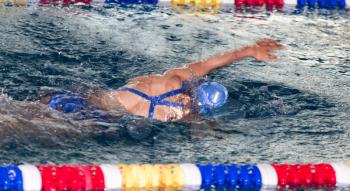 Girl swimming in the pool