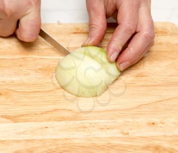 Cook chopped onion on the board