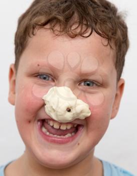 boy with a test on the nose