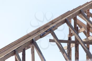 Wooden roof frame on a construction site