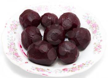 boiled beets on a white background