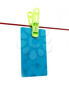 Plastic card on a rope on a white background .