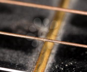 Detail of a guitar string as a background. macro