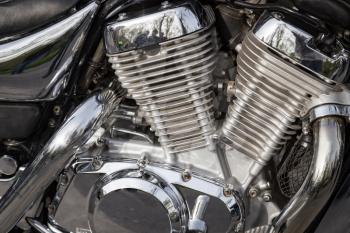 A metal detail on a motorcycle as a background.