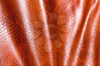 Brown leather material as background. Abstract texture