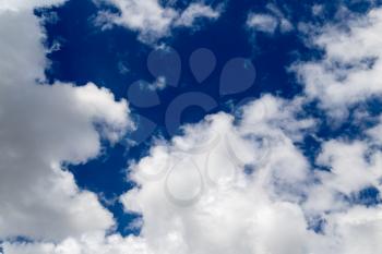 Beautiful clouds against blue sky as background .