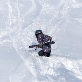 Skier skiing in the snow in winter