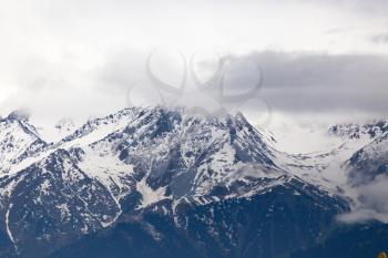 Mountain ridge with snowy peaks in Tien Shan .