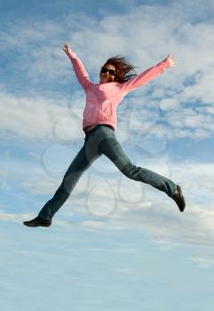 Royalty Free Photo of a Woman Jumping