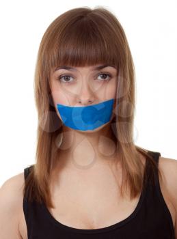 Royalty Free Photo of a Girl With Her Mouth Taped