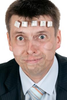 Royalty Free Photo of a Businessman With Computer Keys on His Head