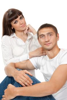 Portrait of a beautiful couple in bright clothing. Isolate on white