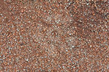 background of small stones of red granite