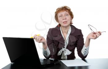 middle-aged woman at a computer on a white background