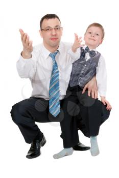 businessman and his son pulled his hands in the studio, isolate on white