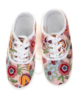 women's sneakers with floral pattern isolated on a white background