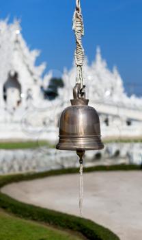 bell on the front of the White Temple Chiang Mai, Thailand