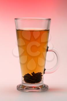 Black tea in a glass. Studio photography